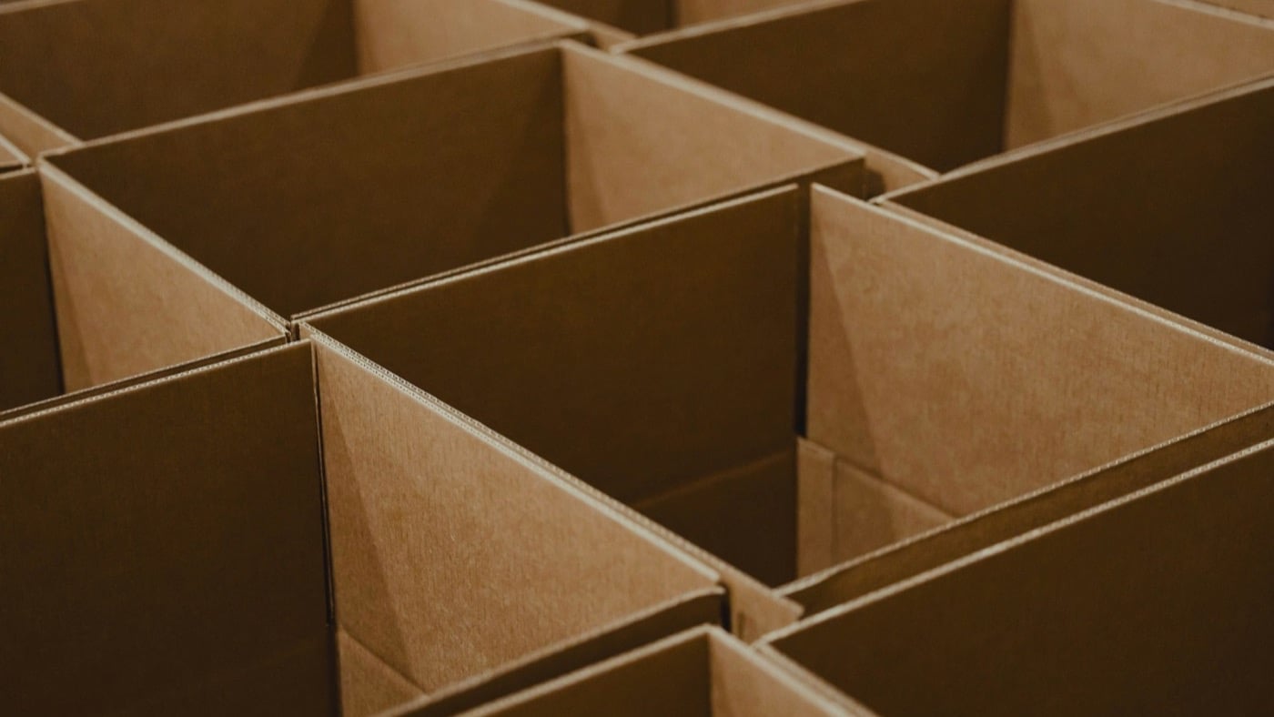 Rows of empty open cardboard boxes